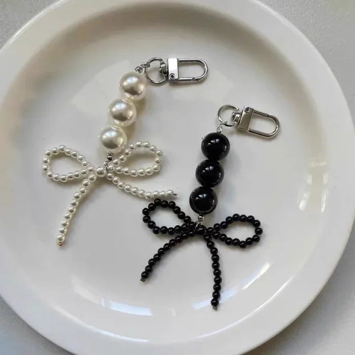 Bijou de sac à nœud nacré